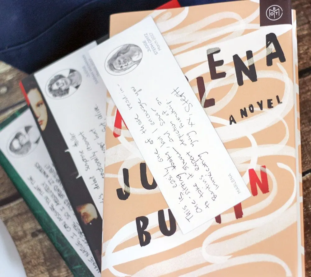 Book of the Month judges include bookmarks with notes about their thoughts on the books