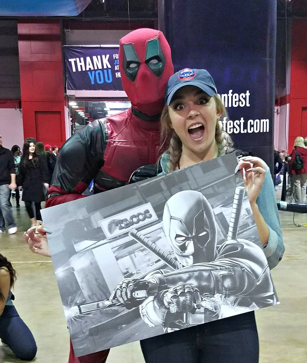 Kit and Deadpool with a Deadpool sketch by Cory Smith. 