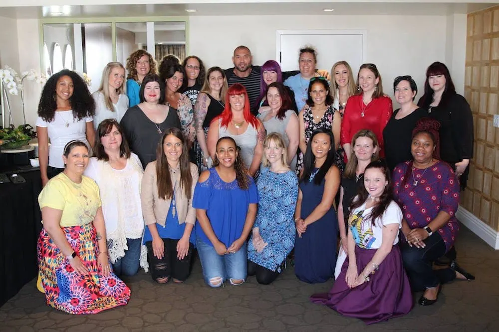 A group of bloggers with Dave Bautista. 