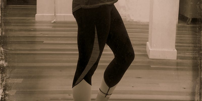 Shelley wearing Reebok Classic shoes in the gym. 