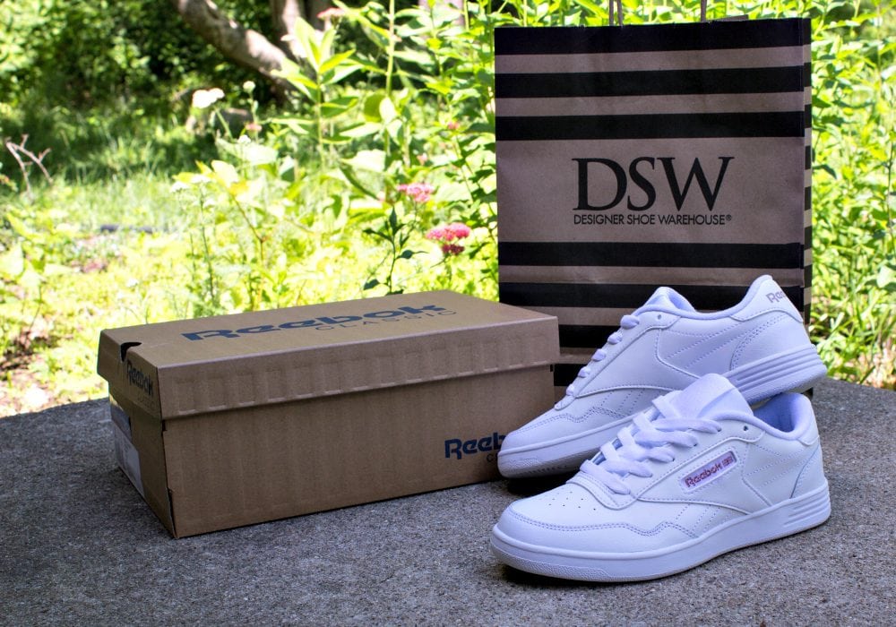 Classic Reebok Shoes for Women next to the shoebox and DSW bag. 