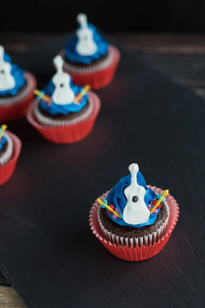 Coco cupcakes with guitars. 