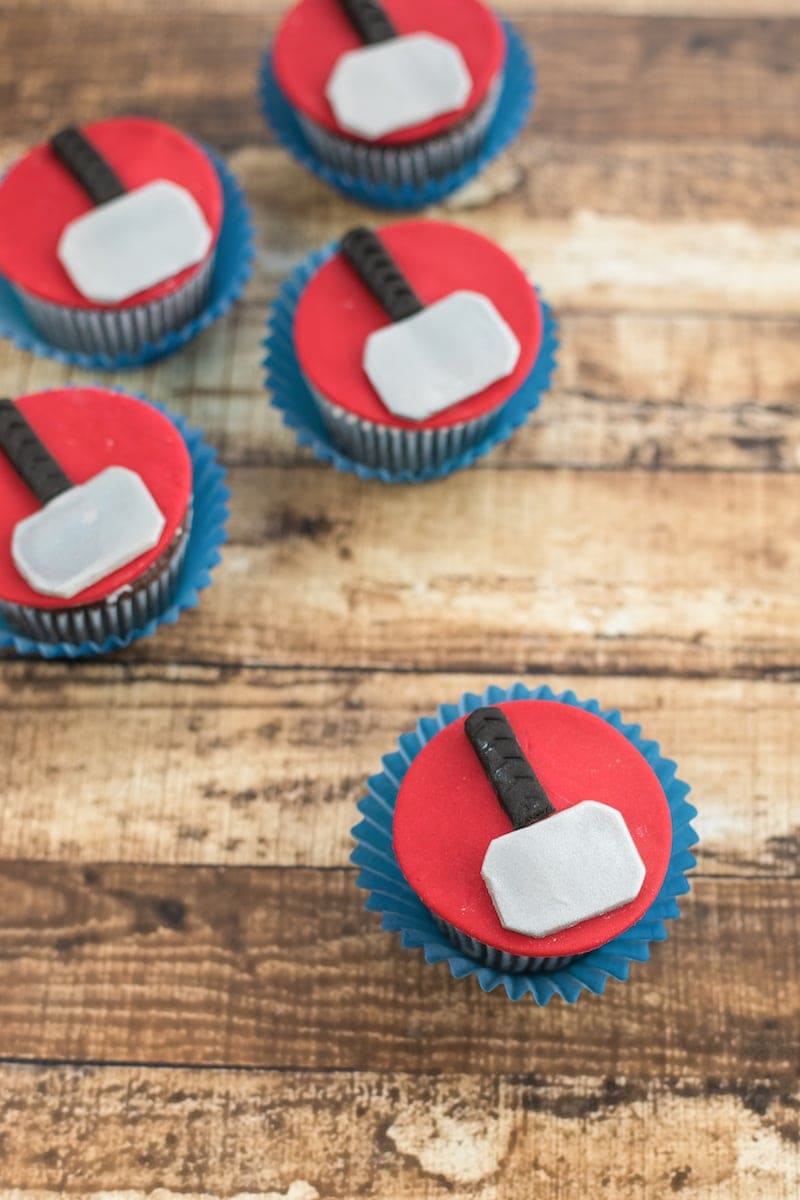 Cupcakes with fondant hammers. 