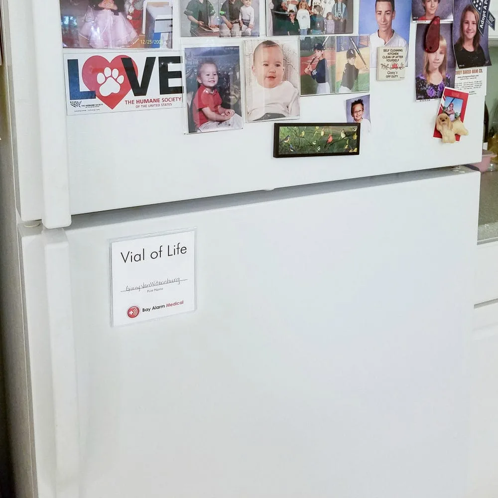 Fridge filled with family pics. 