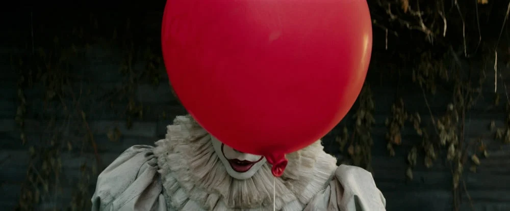 BILL SKARSGÅRD as Pennywise in New Line Cinema's horror thriller "IT," a Warner Bros. Pictures release.