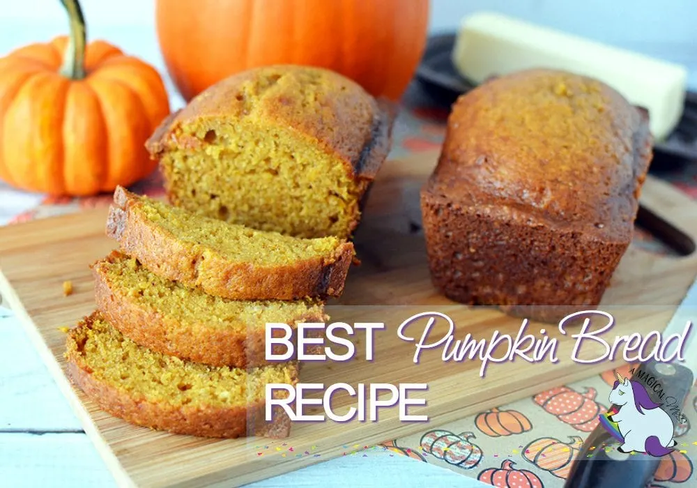 A cutting board with sliced pumpkin bread on it. 