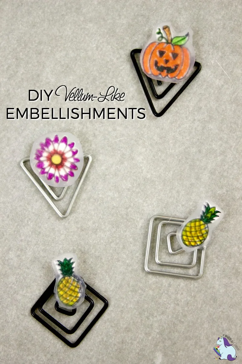 Pumpkin, flower, and pineapple embellishments on paperclips. 