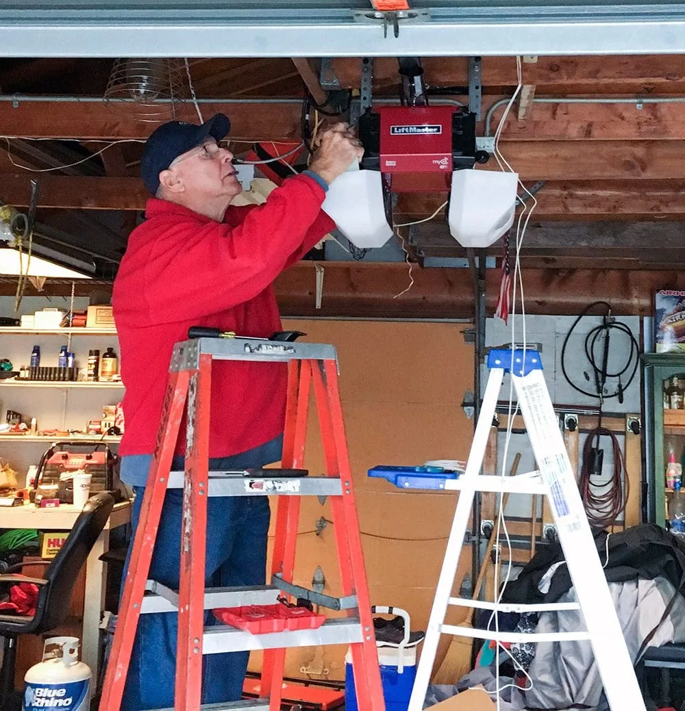 Jack Helson installing our new LiftMaster garage door opener. 