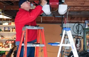 Jack Helson installing our new LiftMaster garage door opener.