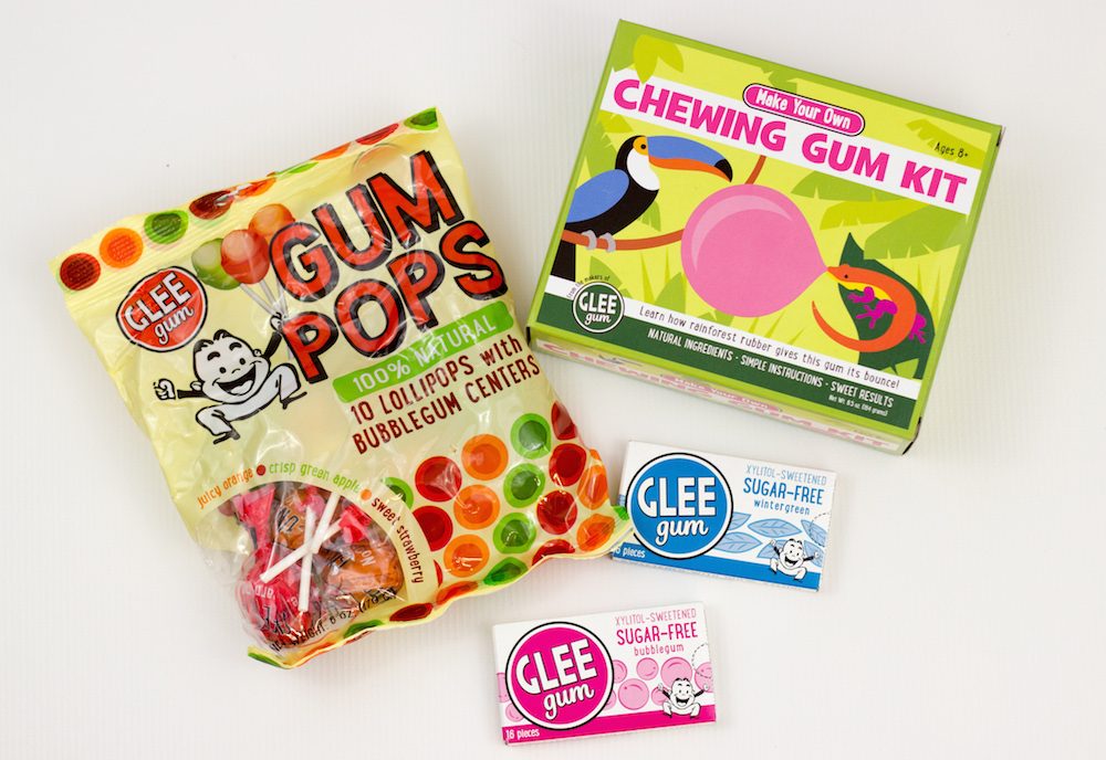 Glee Gum products including gum pops, a chewing gum DIY kit, and two packs of sugar-free gum. 