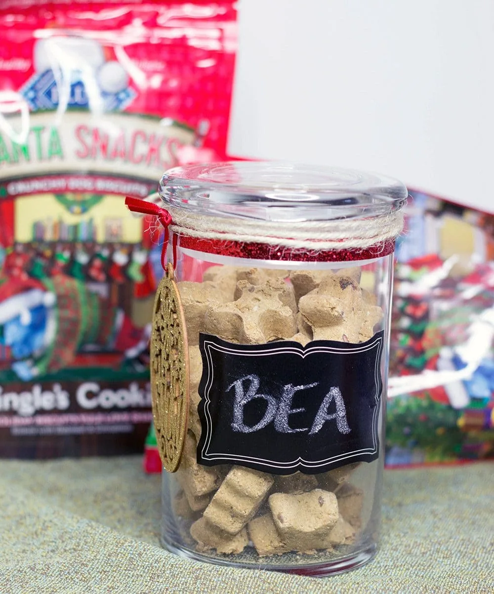 Dog treats jar next to Blue Buffalo Santa Snacks. 