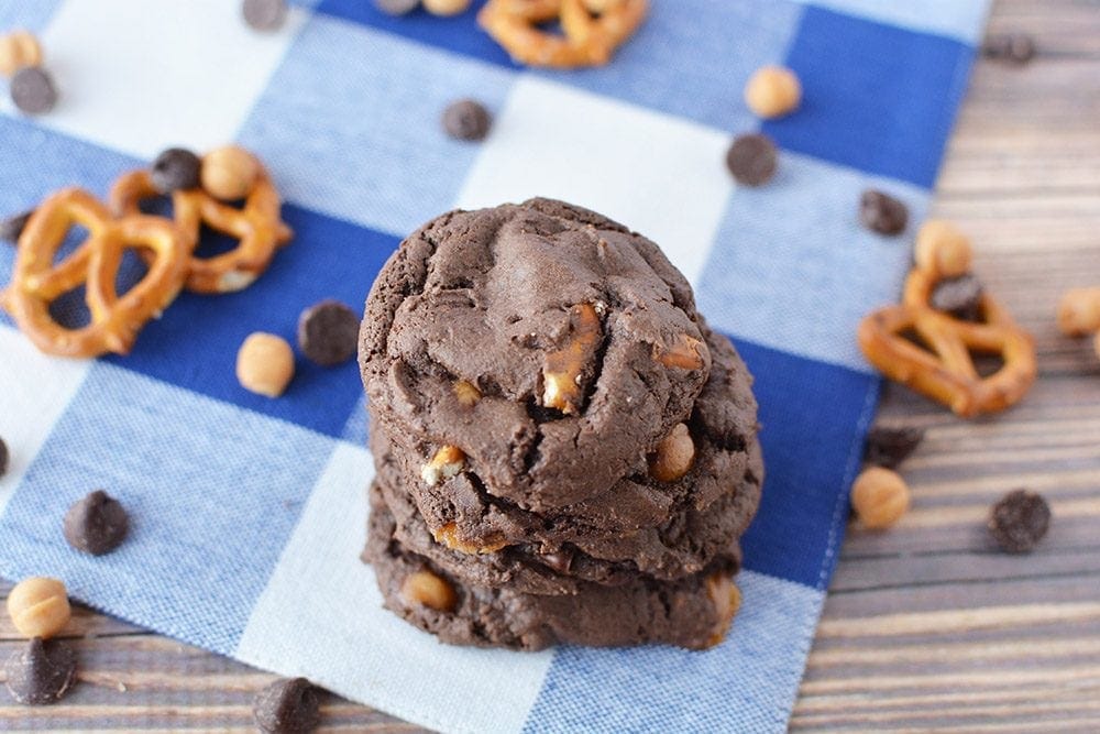 Chocolate cookies with pretzels in them.