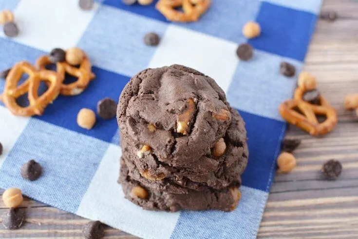 Chocolate cookies with pretzels in them.