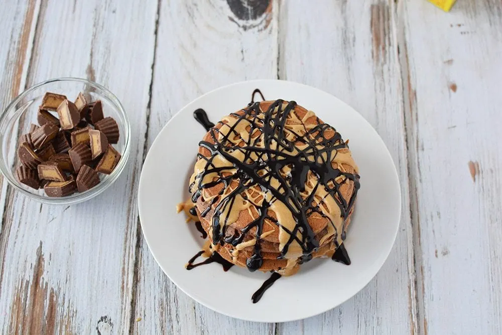 Overhead shot of chocolate peanut butter cup pancakes.