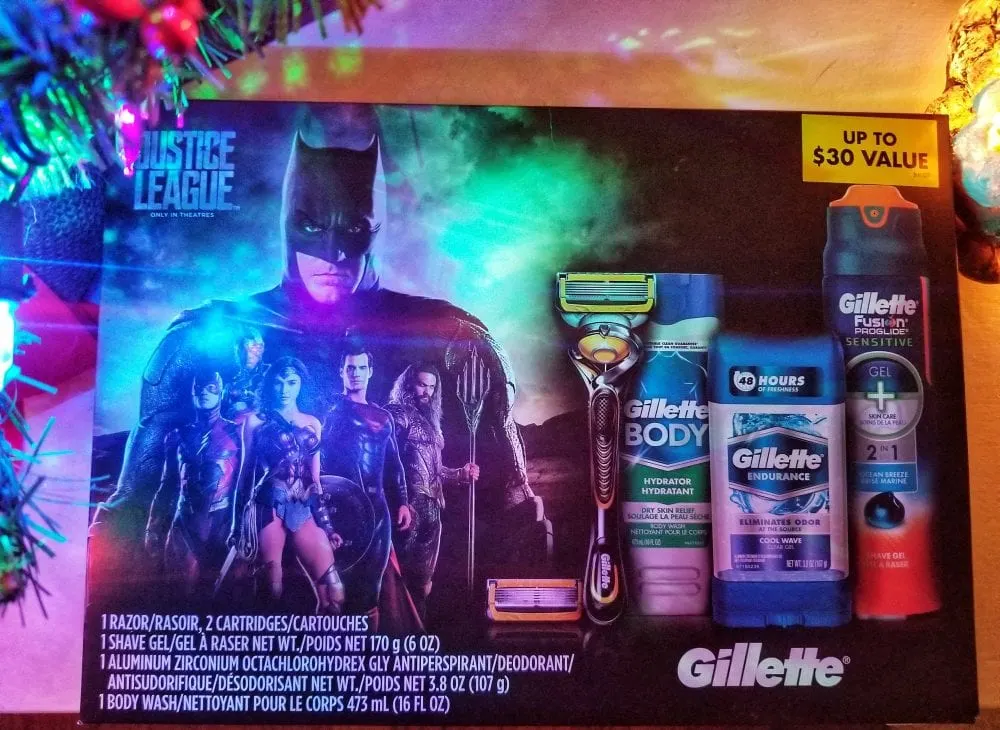 Justice League Gillette gift set under a tree. 