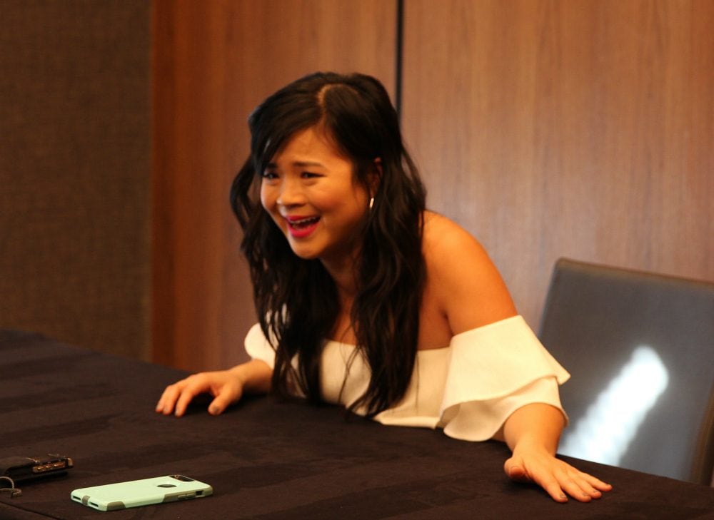 Kelly Marie Tran laughing during an interview. 