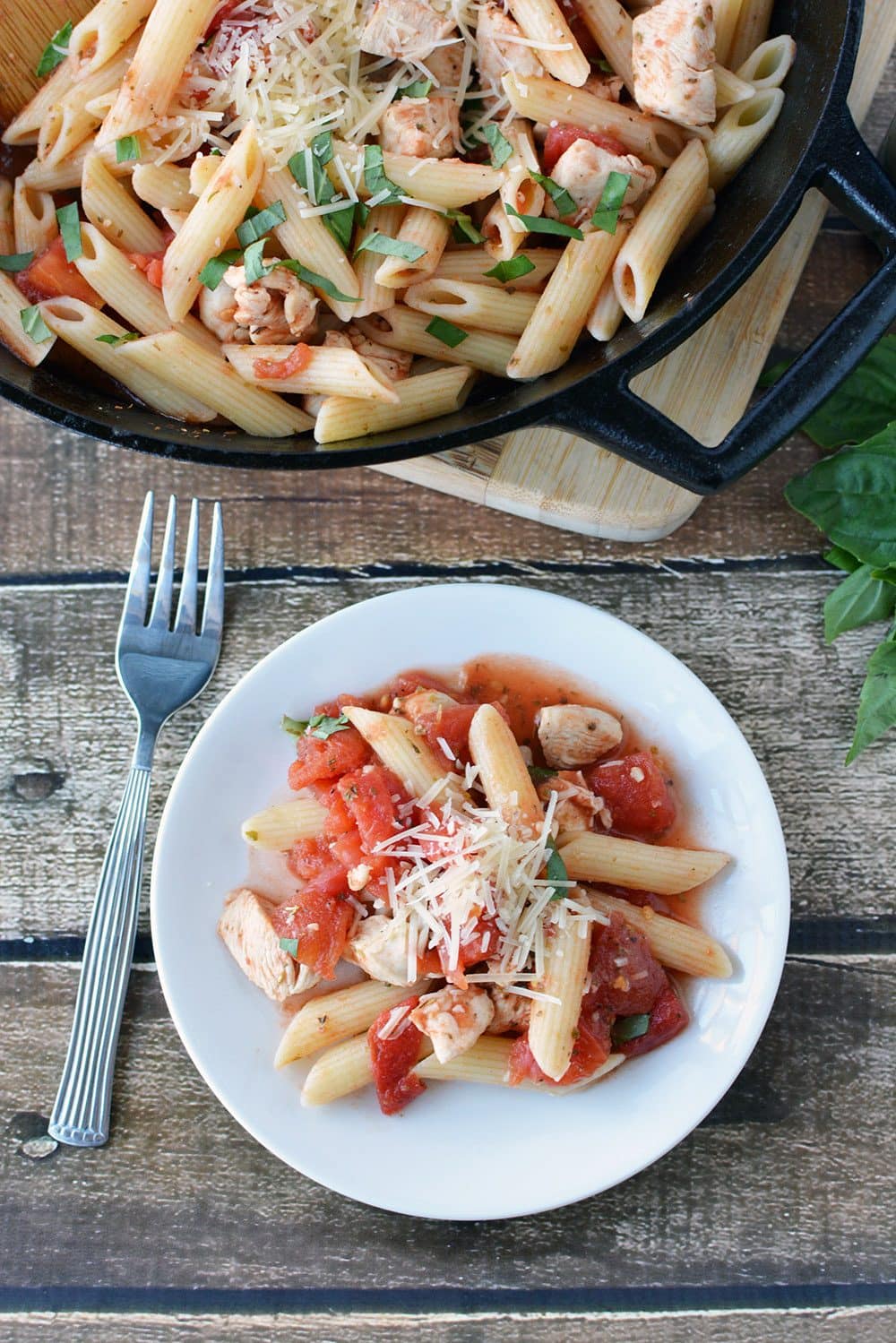 Pasta chicken with tomato sauce in a skillet