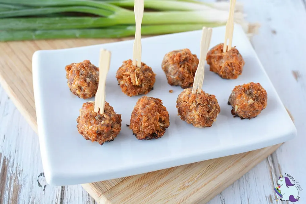 Sausage bites with wooden sticks in them. 