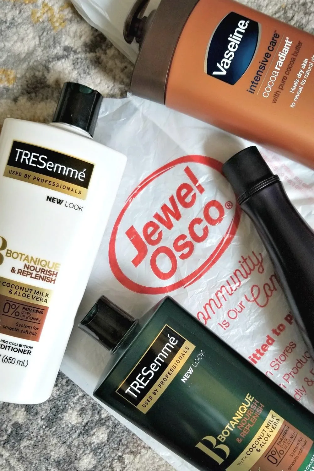 Jewel Osco bag with Tresemme products on top. 