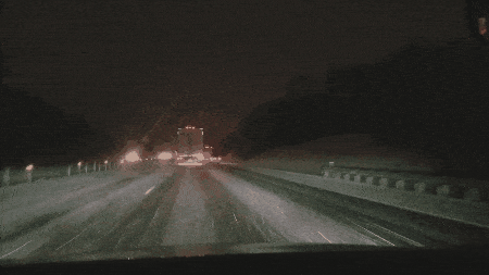 Driving down a snowy highway