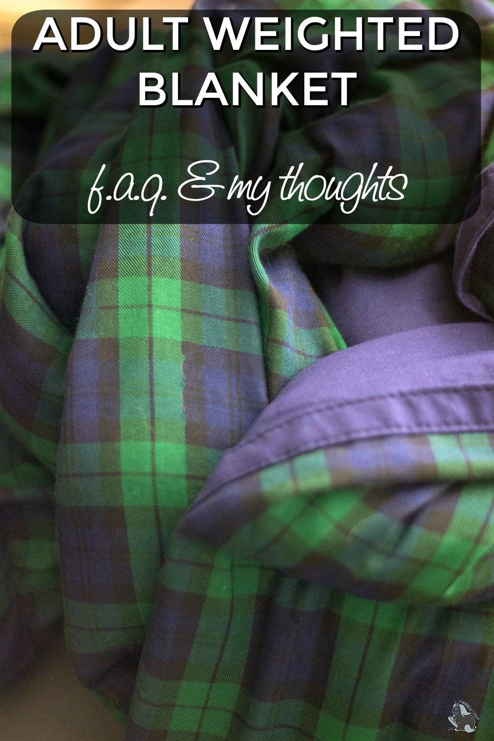 Closeup of a green and blue plaid blanket. 