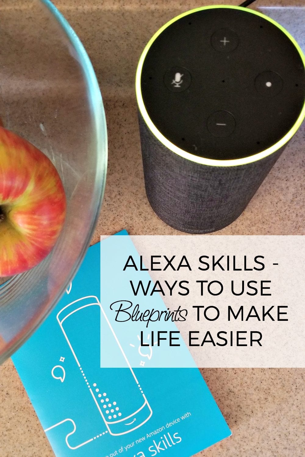 Alexa on the counter with apples.