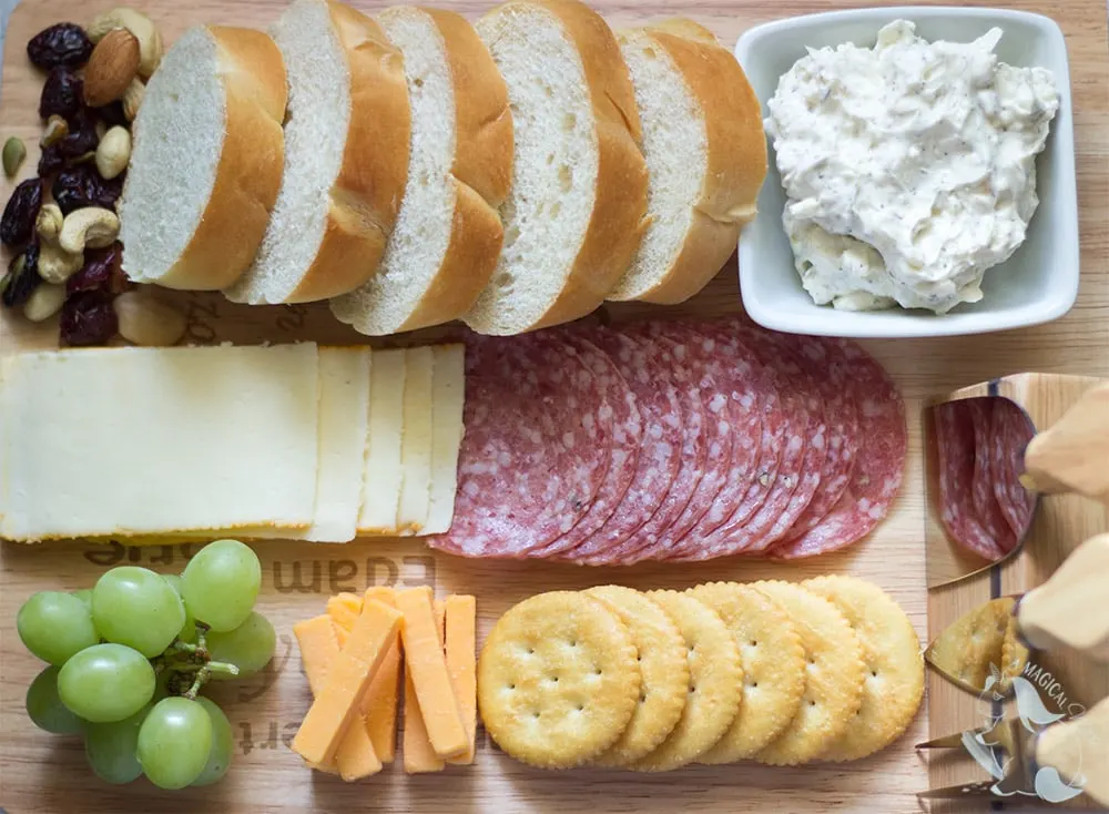 Charcuterie board with garlic spread