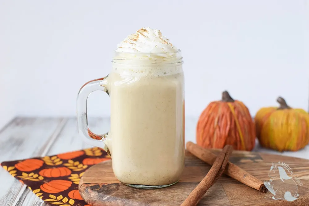 Pumpkin spice coffee drink with whipped cream.