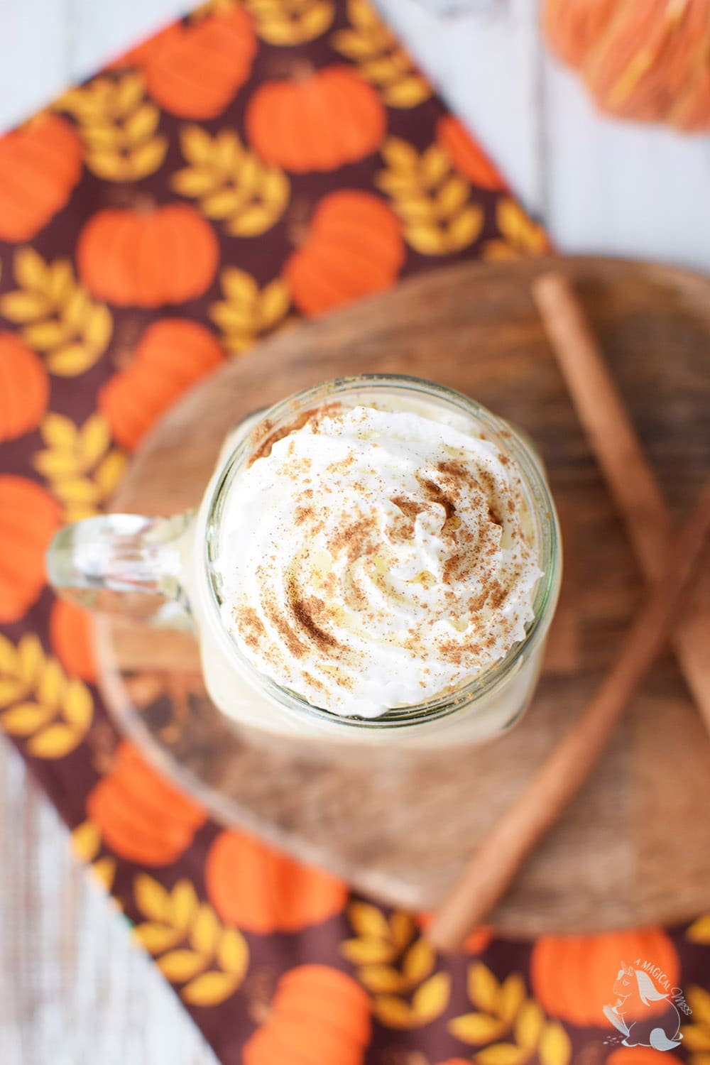 Copycat Starbucks Pumpkin Spice Latte in a mason jar with whipped cream.