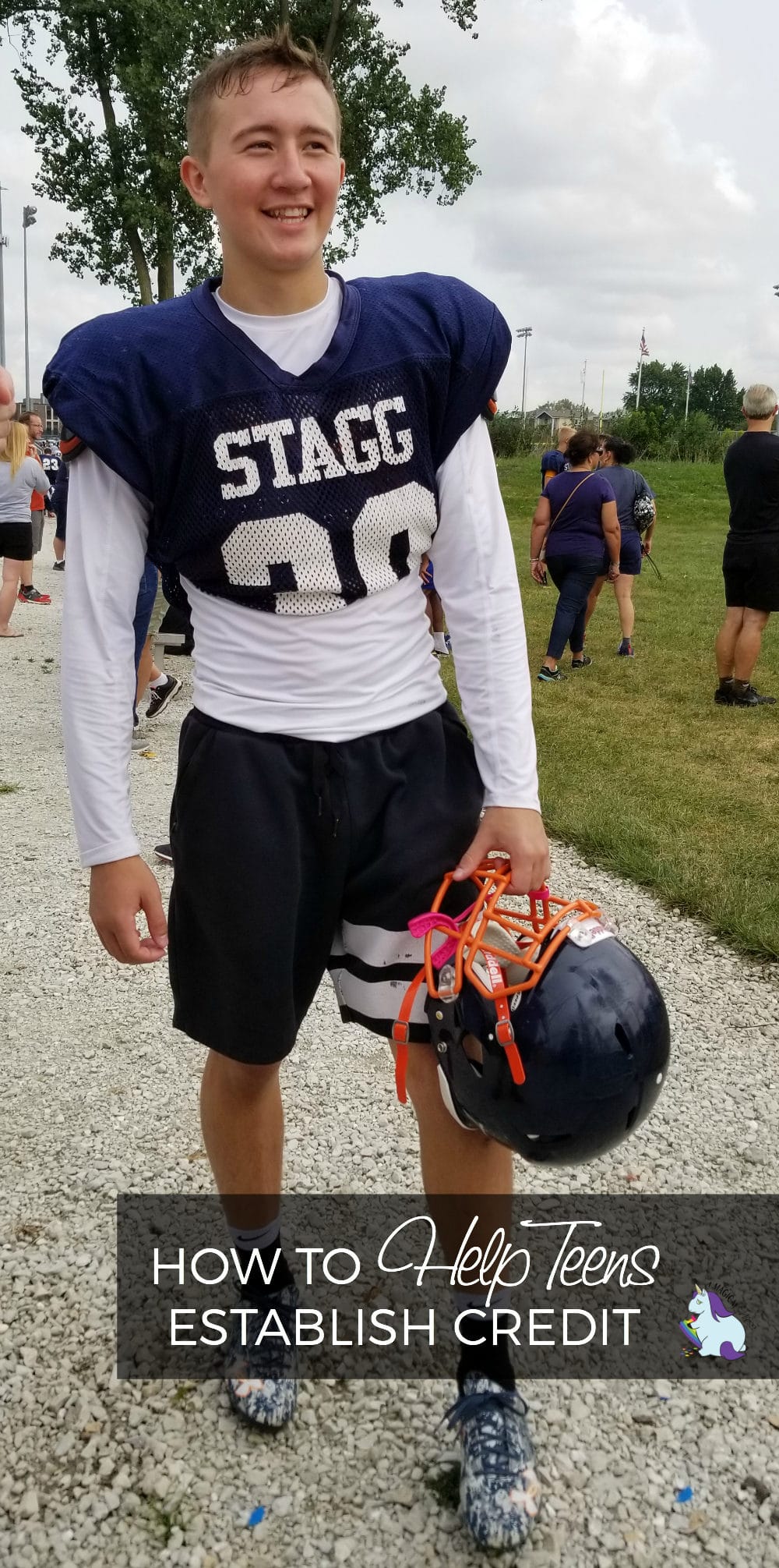Adam smiling in his Stagg football jersey. 