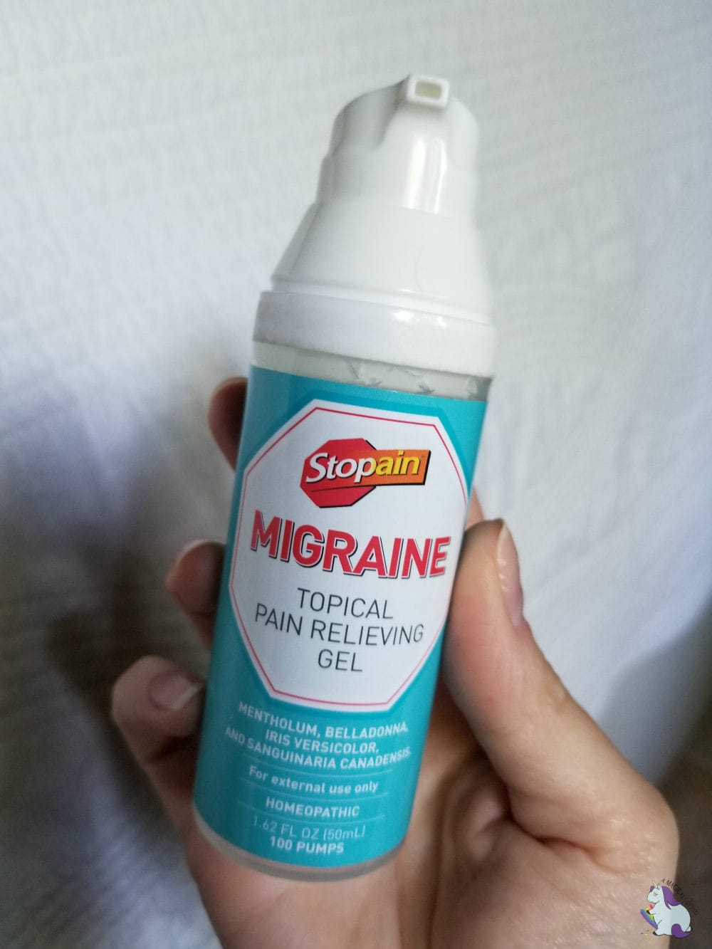 Holding Stopain migraine relieving gel. 