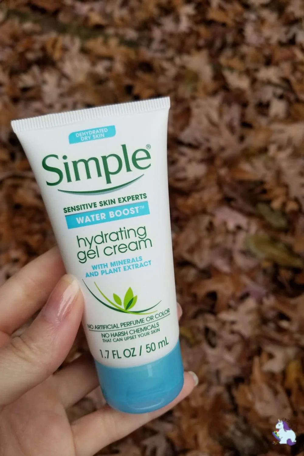 Simple hydrating gel cream above fall leaves. 