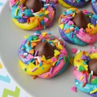 Sparkly and fun unicorn poop cookies on a plate