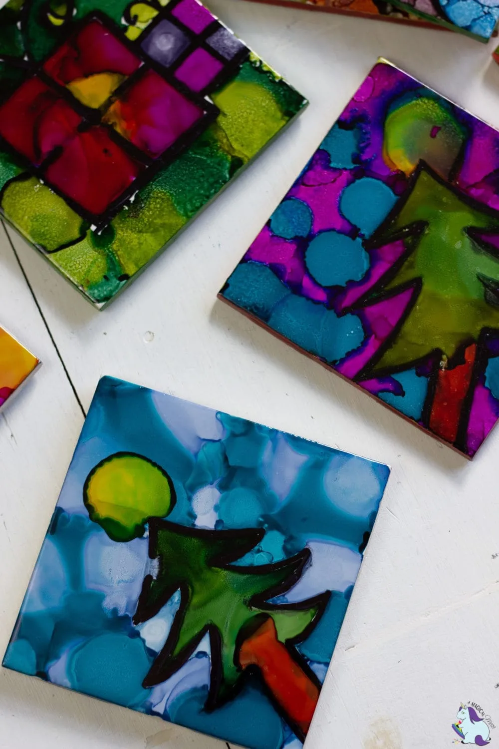 Alcohol ink tree designs on tiles. 