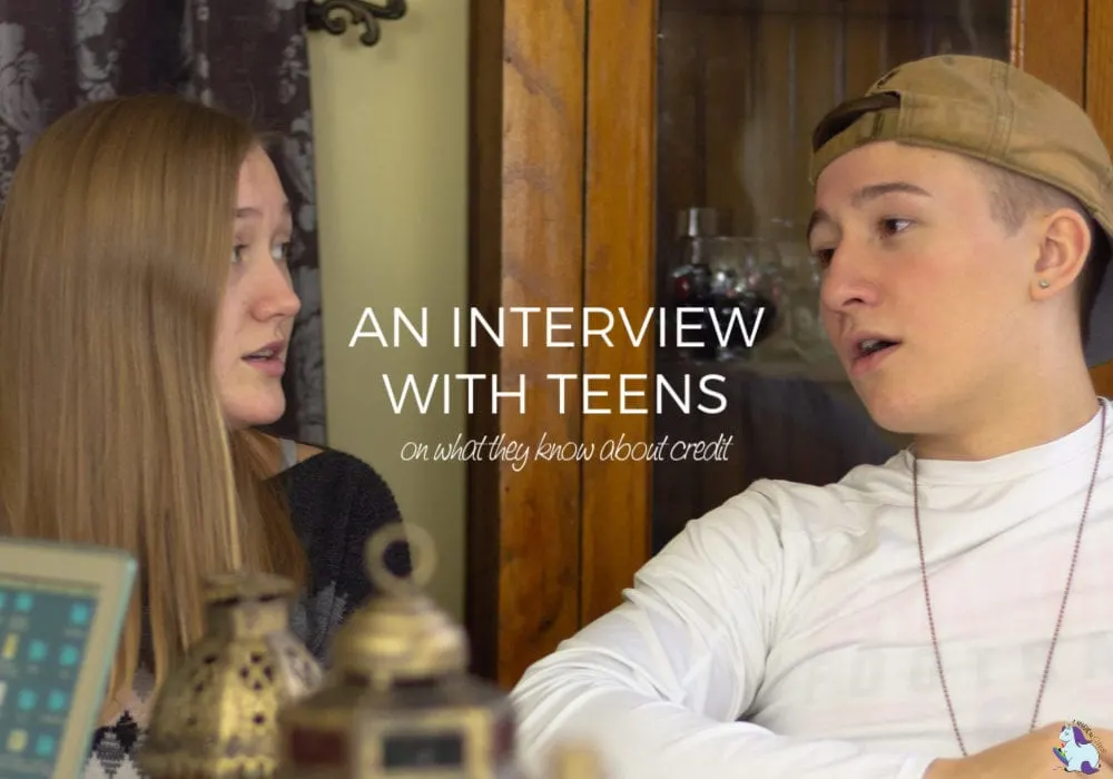 Two teens talking at a table