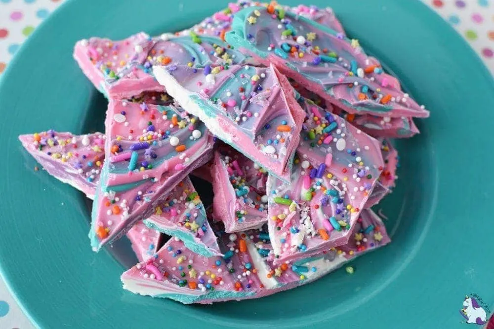 Unicorn bark on blue plate.