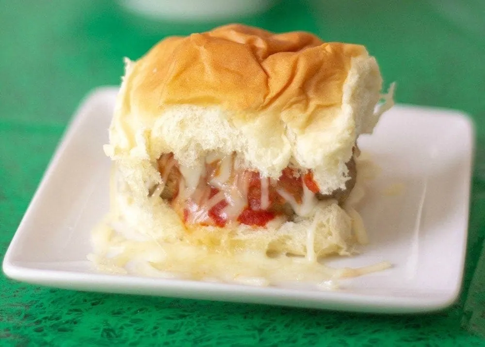 Meatball slider with cheese.