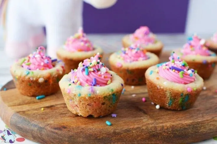 Unicorn cookie cups filled with pink frosting