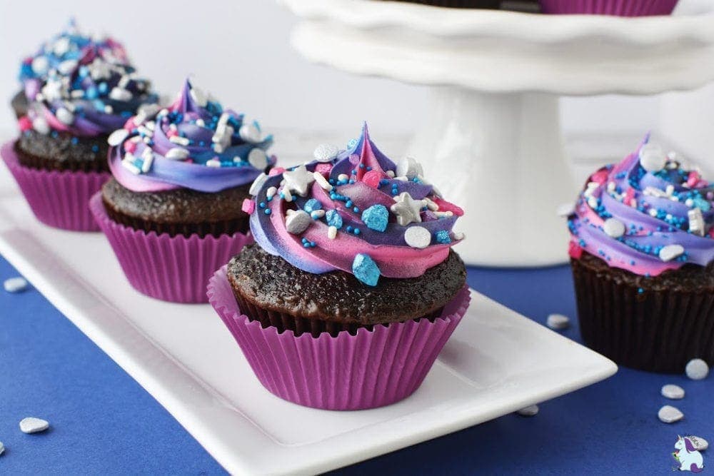 Pretty purple and blue frosted chocolate cupcakes.
