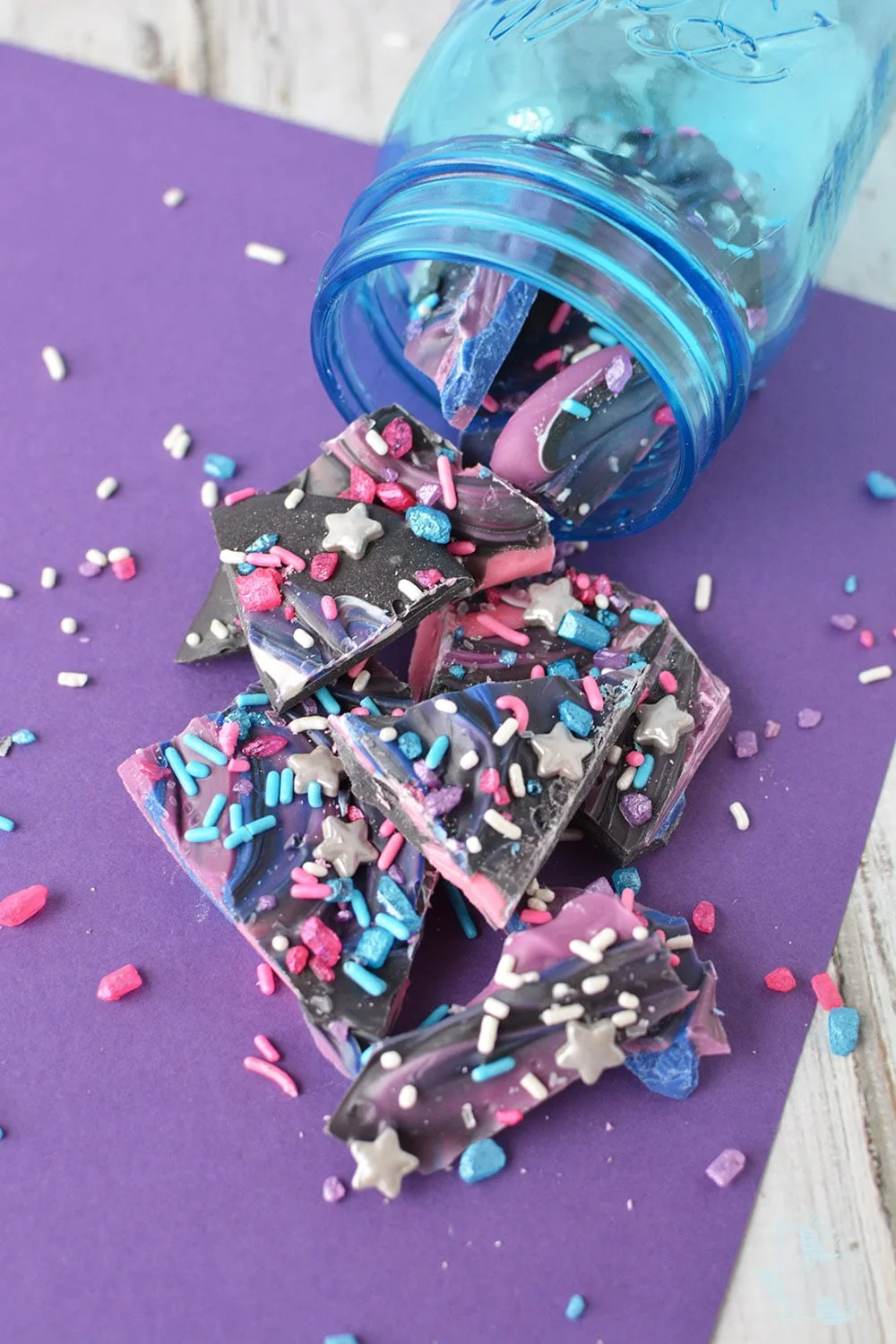 Mason jar with space bark candy. 