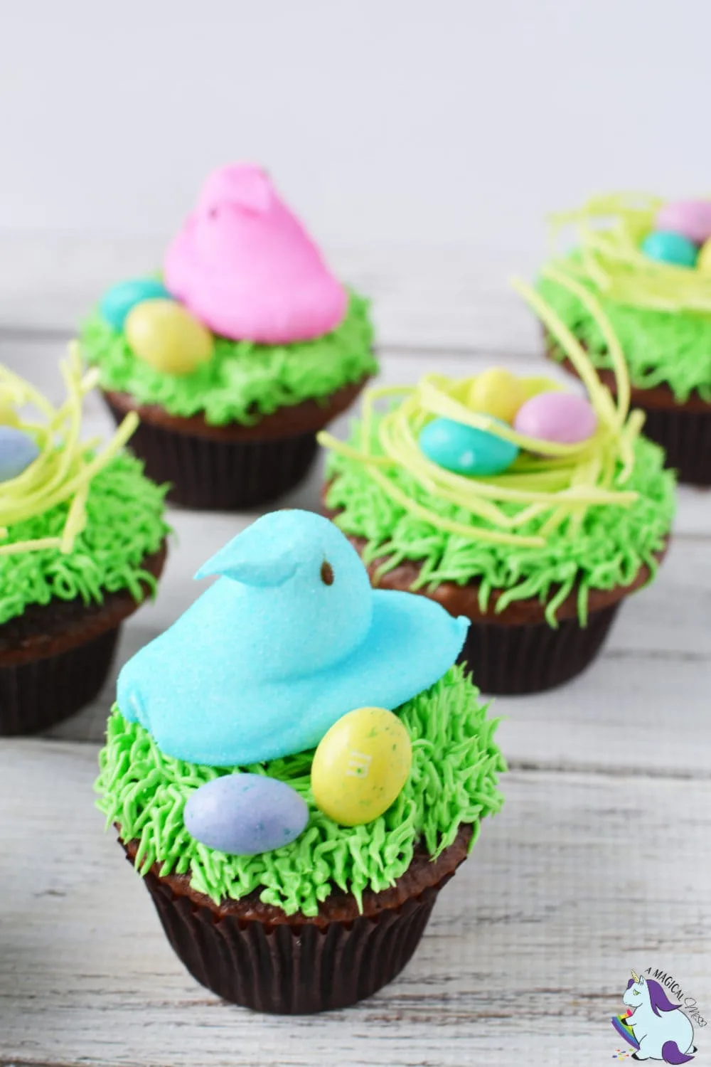 Easter Peep's nest cupcakes with edible grass, eggs, and birds. 