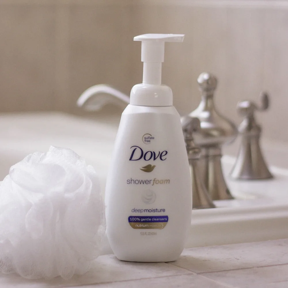Dove sitting on bathtub ledge with a shower poof. 