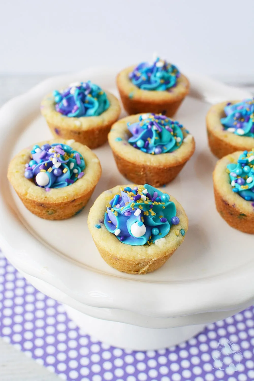Mermaid party cookie cups on a plate. 