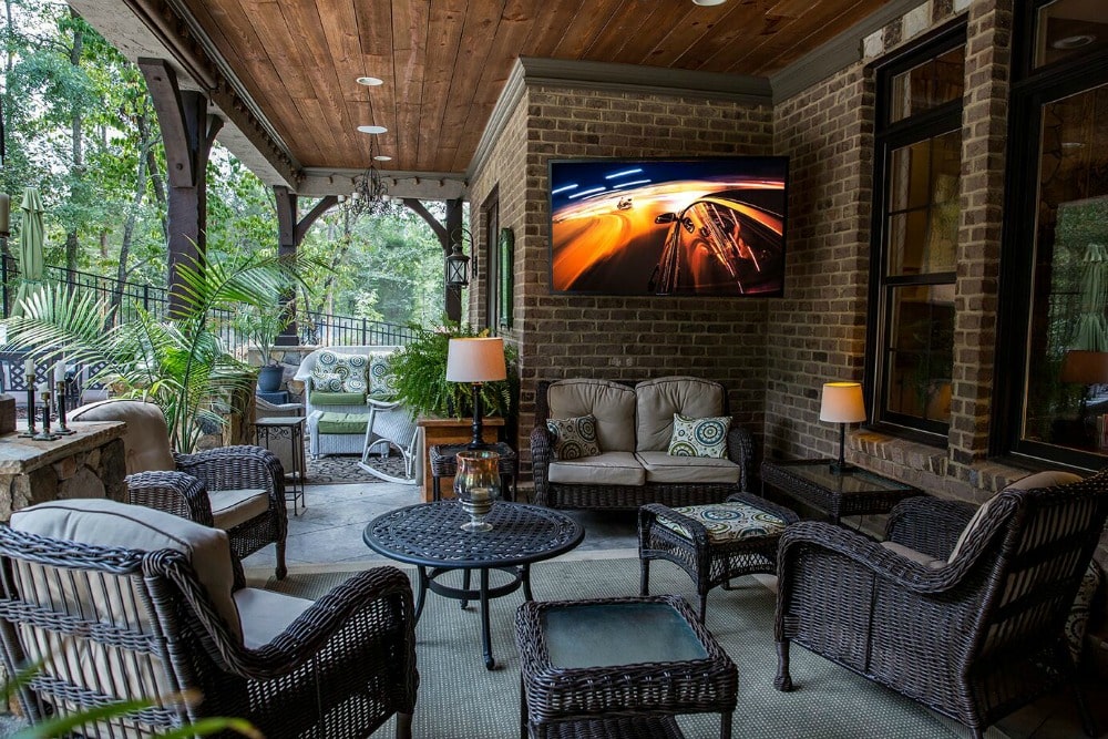 Nice outdoor porch area with an outdoor tv. 