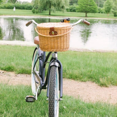 Bike with picnic basket attached to front.