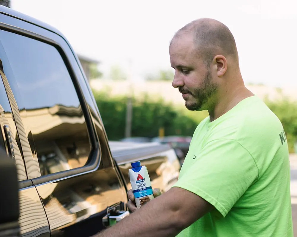 Mike leaving for work with an Atkins Shake.