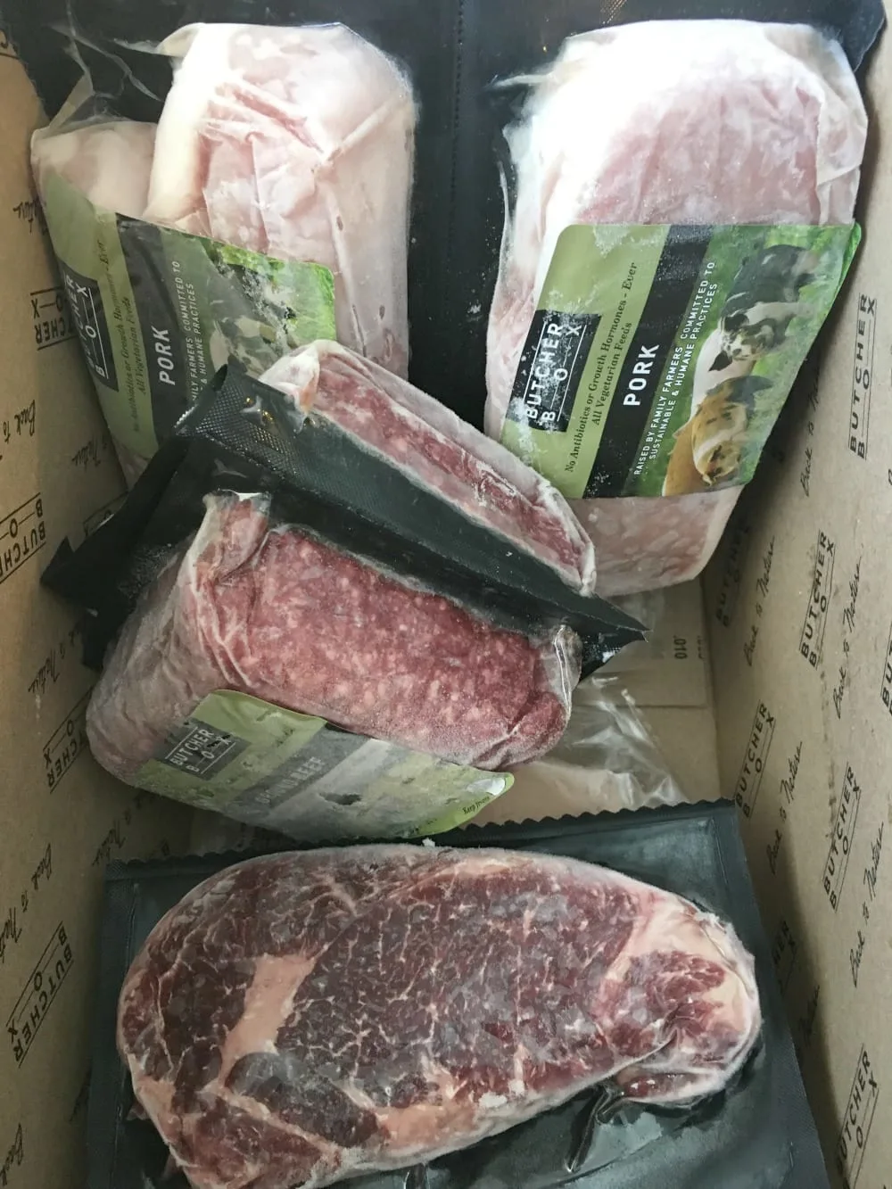 The contents of our first ButcherBox - mixed meats box. 