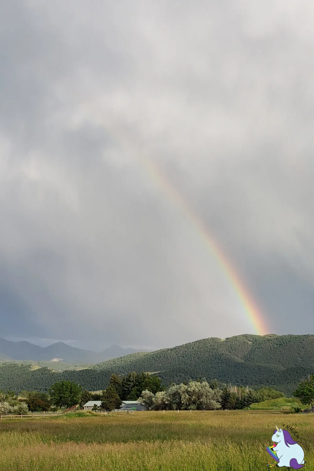 A rainbow over a mountain. 
