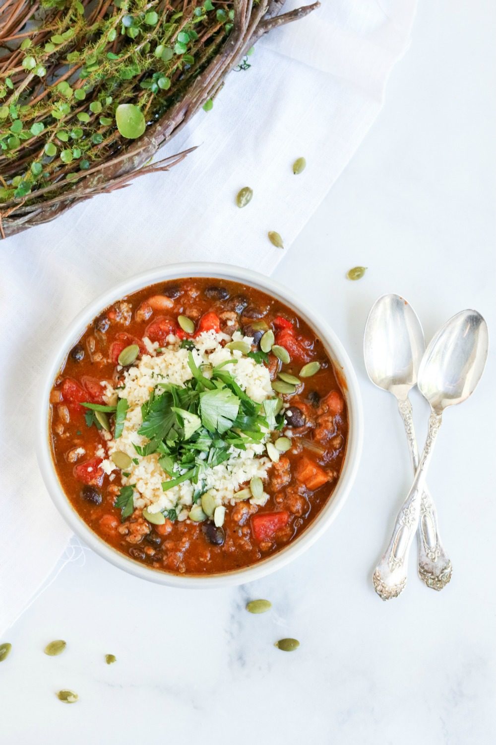 Pumpkin chili in a bowl on a table. 