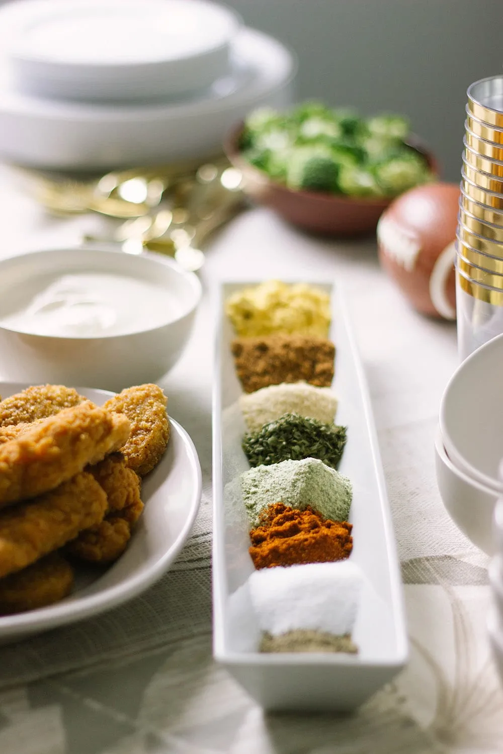 Line of seasonings on a table. 